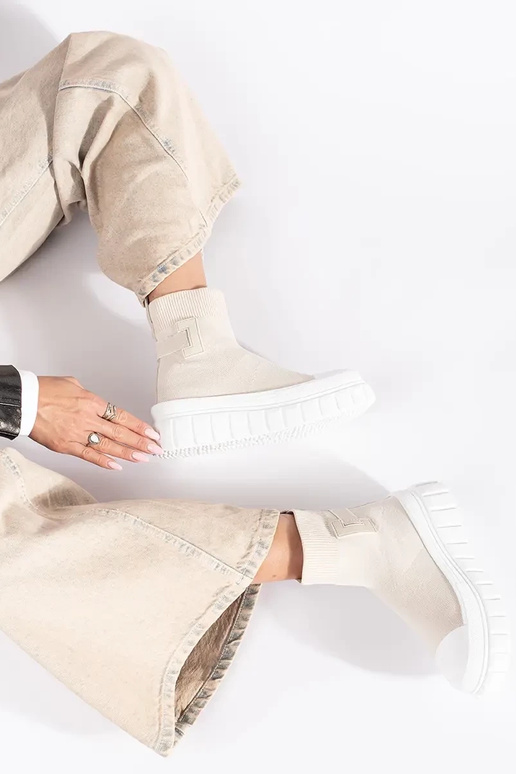 ivoorkleurige hoge platformlaarzen