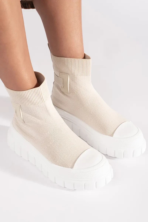 ivoorkleurige hoge platformlaarzen