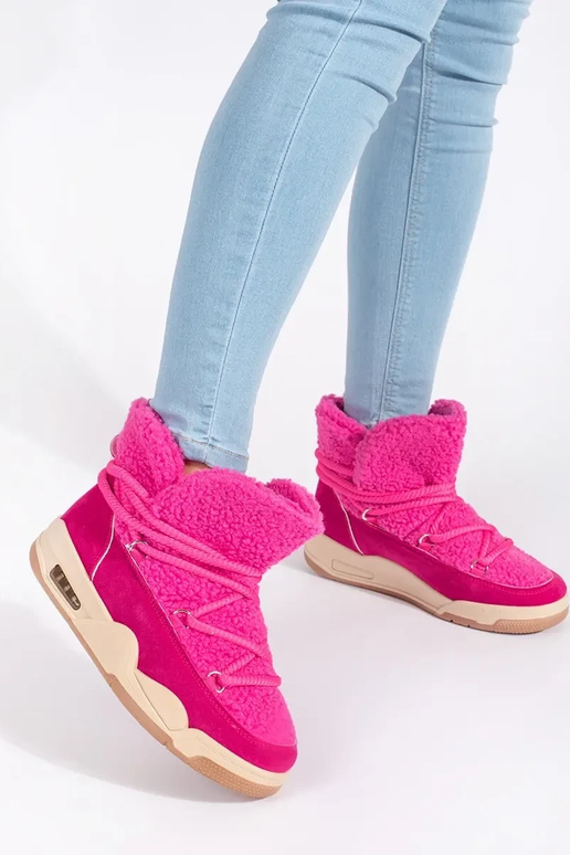 roze SnoInboots voor dames op een...