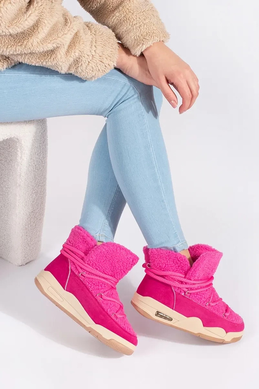 roze SnoInboots voor dames op een...