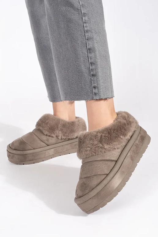 beige laag aantrekken SnoInboots voor...