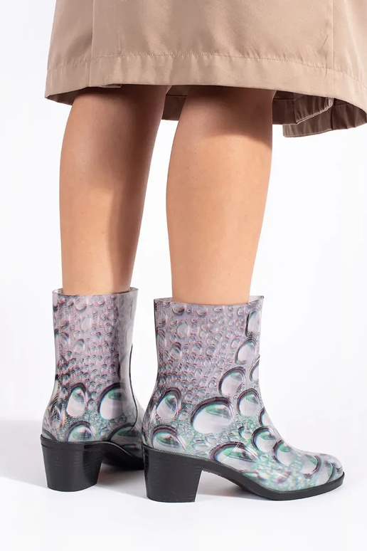 Regenlaarzen In krople op hoge hakken