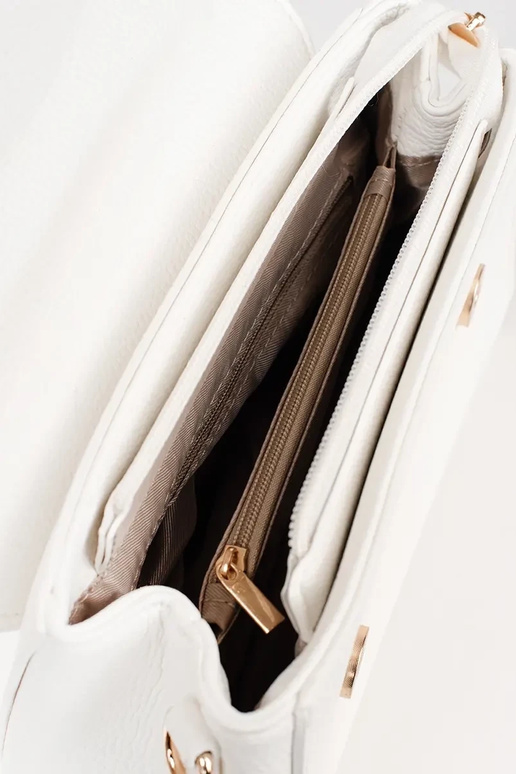 Witte kleine tas met gouden elementen
