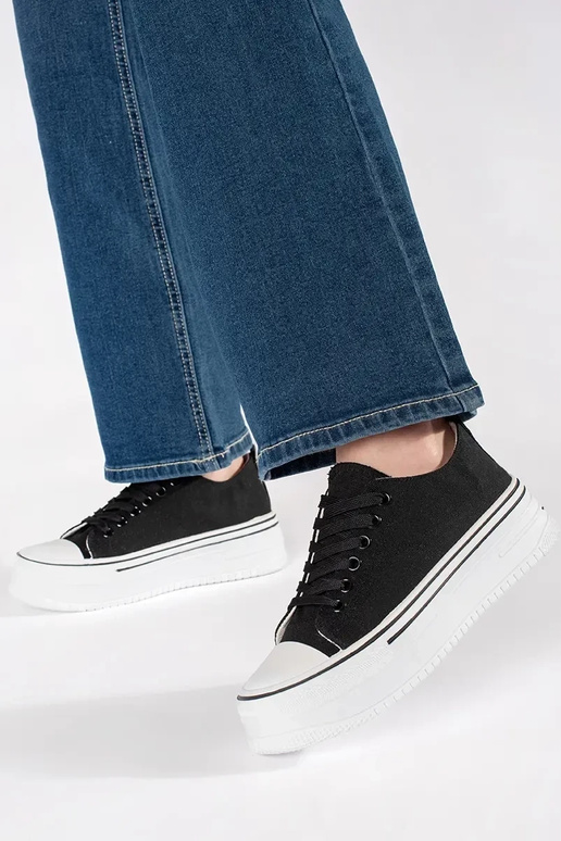 Zwarte klassieke damessneakers op...