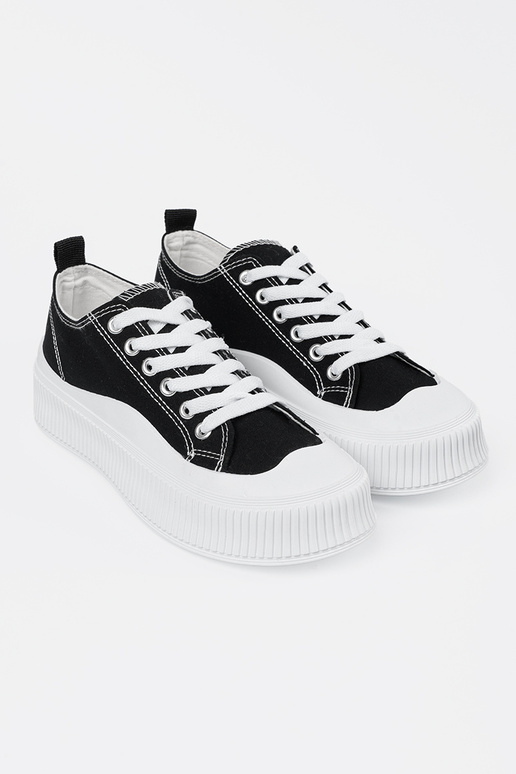 Zwart-Witte Sneakers model met dikke... Zwart-Witte Sneakers model met dikke...