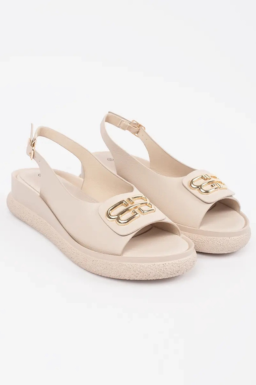 Platte sandalen beige met decoratie