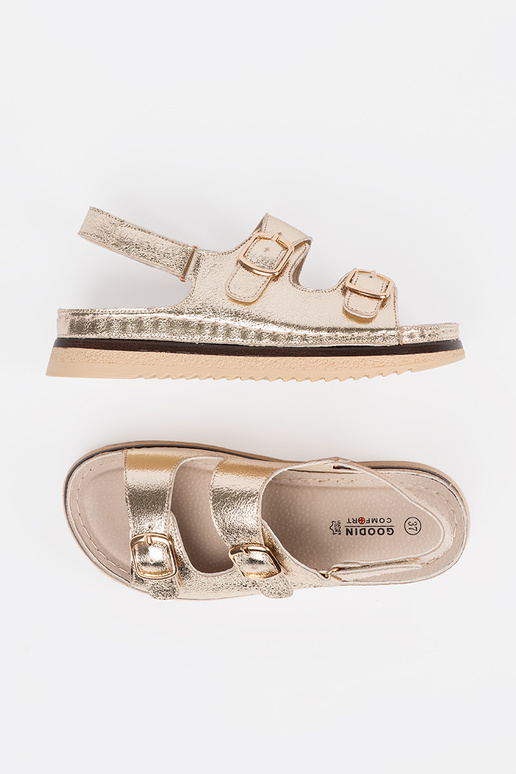 Gouden sandalen met gouden elementen
