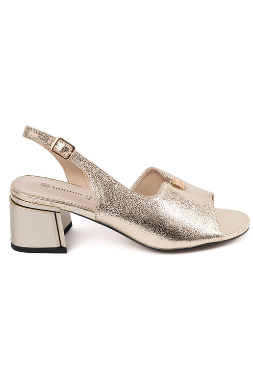 Gouden suède dames sandalen op hoge hak Gouden suède dames sandalen op hoge hak