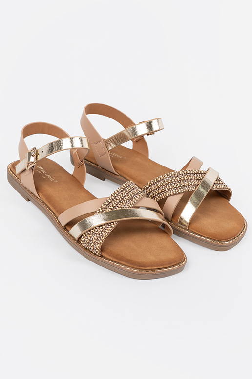 Witte dames sandalen op een platte...