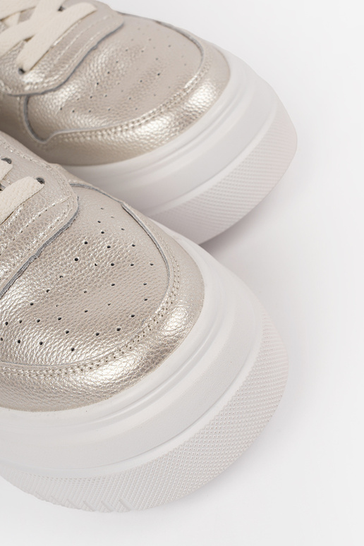 Gouden leren dames sneakers met... Gouden leren dames sneakers met...