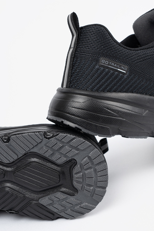 Zwarte herensportschoenen met groene... Zwarte herensportschoenen met groene...