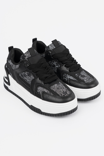 Zwart-witte dames sneakers... 2