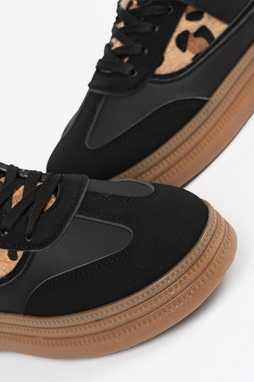 Dames zwarte sportschoenen met... Dames zwarte sportschoenen met...