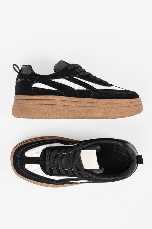 Zwarte dames sneakers met witte details Zwarte dames sneakers met witte details