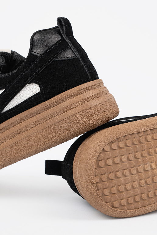 Zwarte dames sneakers met witte details Zwarte dames sneakers met witte details