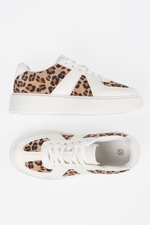 Witte sportschoenen met... Witte sportschoenen met...