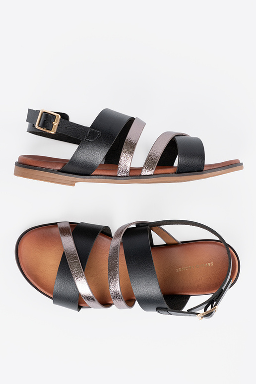 Gouden sandalen op een lage hak