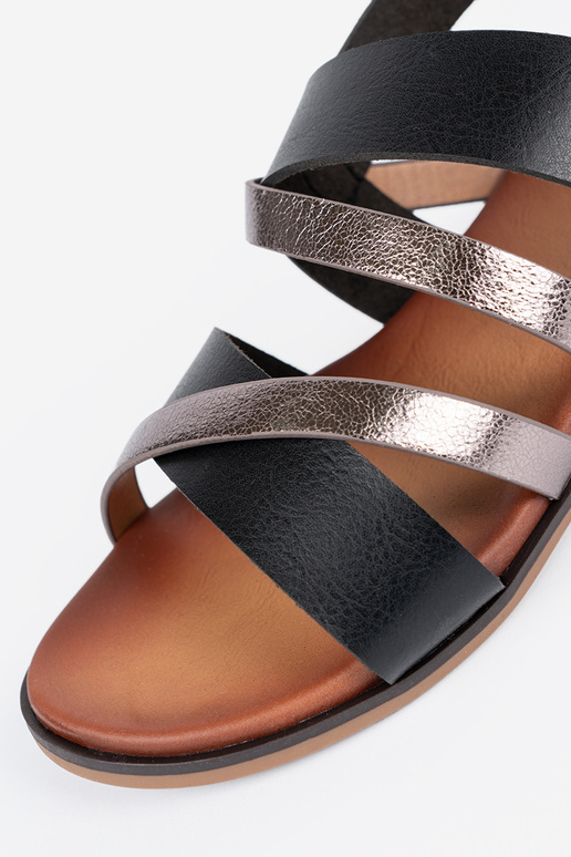 Gouden sandalen op een lage hak