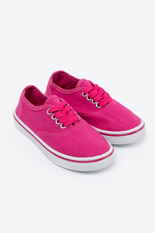Roze kinderschoenen met een witte zool