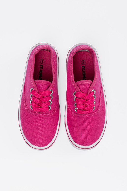 Roze kinderschoenen met een witte zool