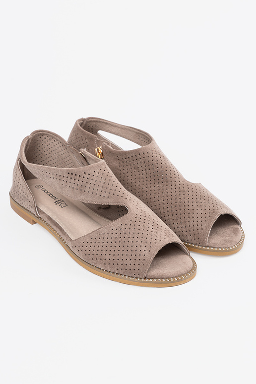 Vlakke opengewerkte sandalen in... Vlakke opengewerkte sandalen in...