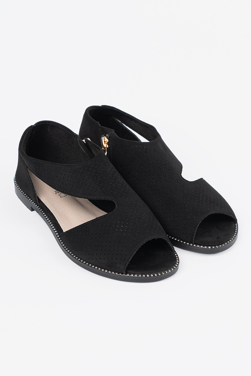 Vlakke opengewerkte sandalen in... Vlakke opengewerkte sandalen in...