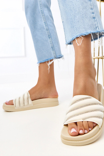 Zandkleurige pantoffels met...