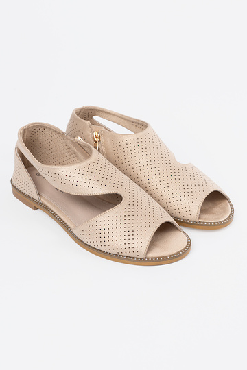 gouden kleur sandalen opengeInerkt op een platte zool