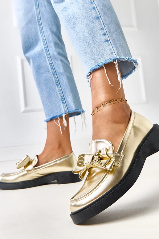 Gouden mocassins met strik en...