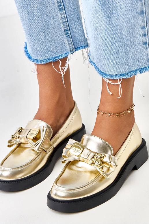 Gouden mocassins met strik en...