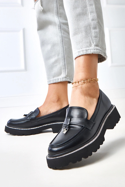 Zwarte mocassins met versiering en...