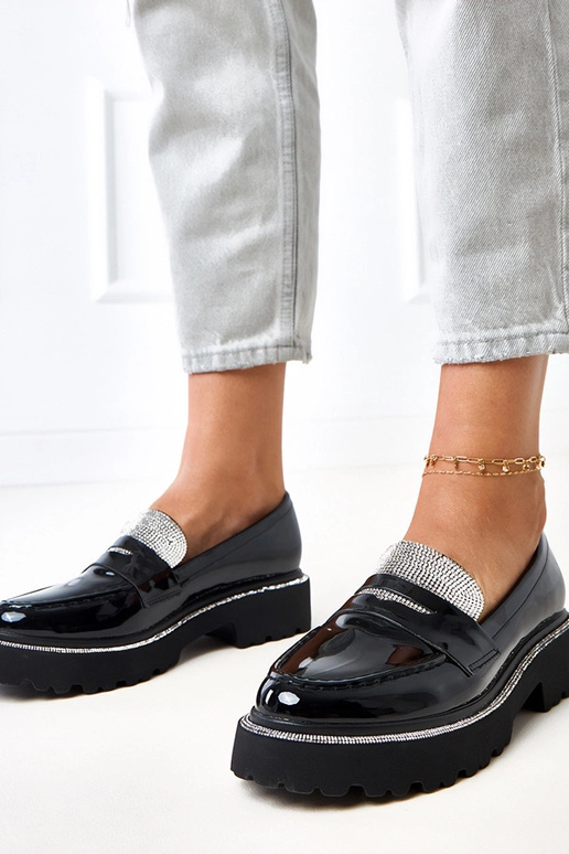 Zwarte lak mocassins versierd met...