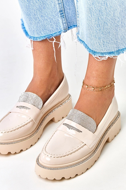 Beige lak mocassins versierd met...