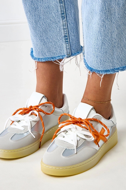 Zilveren sneakers met plateau en... Zilveren sneakers met plateau en...