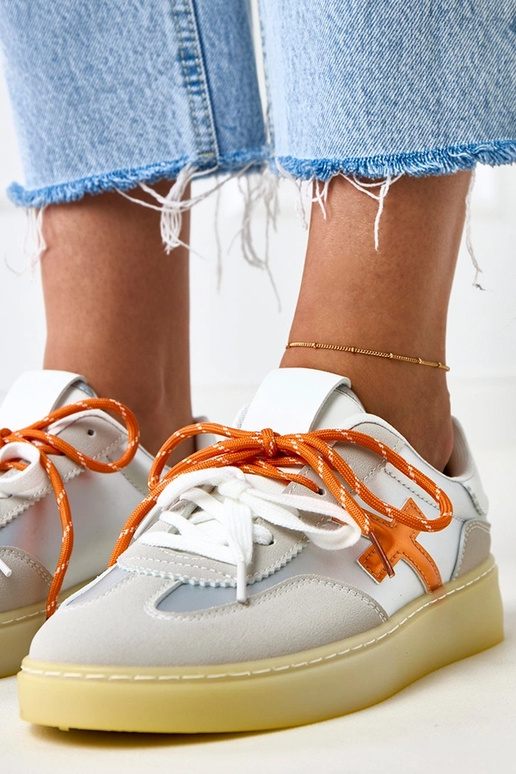 Zilveren sneakers met plateau en... Zilveren sneakers met plateau en...