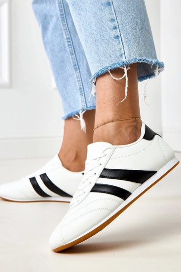 Witte tennissneakers met... 2