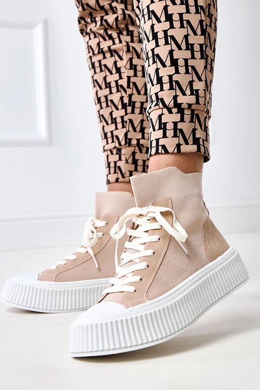 Roze instappers met sokkenstijl en... Roze instappers met sokkenstijl en...