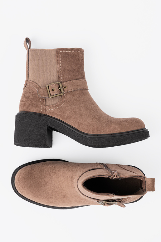 Stijlvol beige laarzen op een stabiele hiel