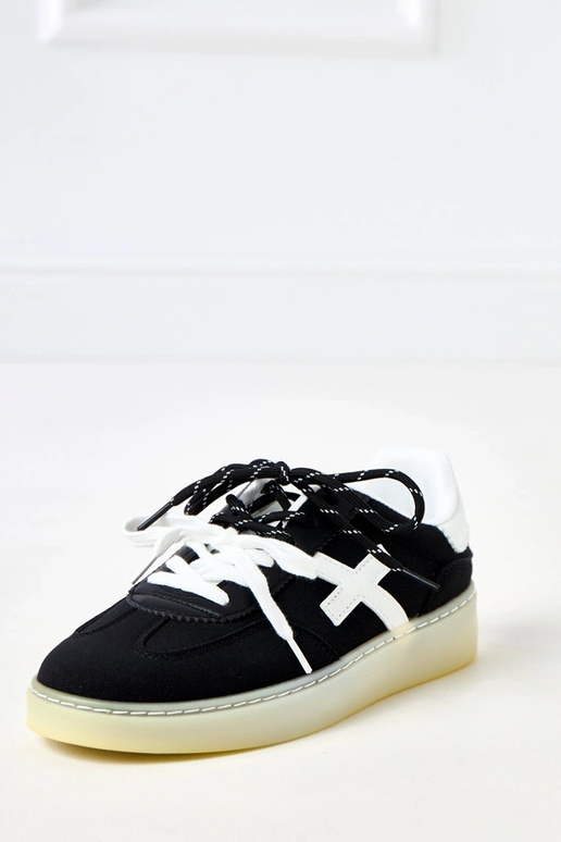 Zwarte sneakers op platform met witte... Zwarte sneakers op platform met witte...