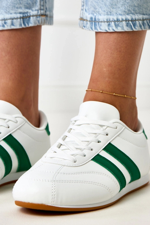 Witte tennisachtige sneakers met... Witte tennisachtige sneakers met...