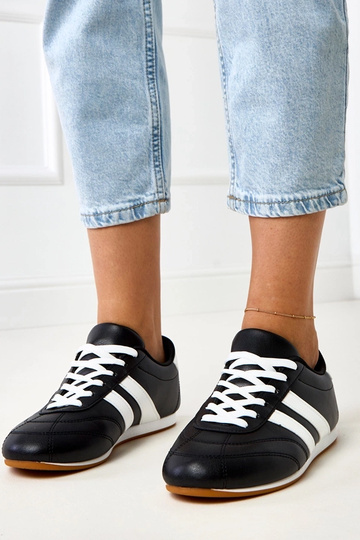 Zwarte tennisachtige...