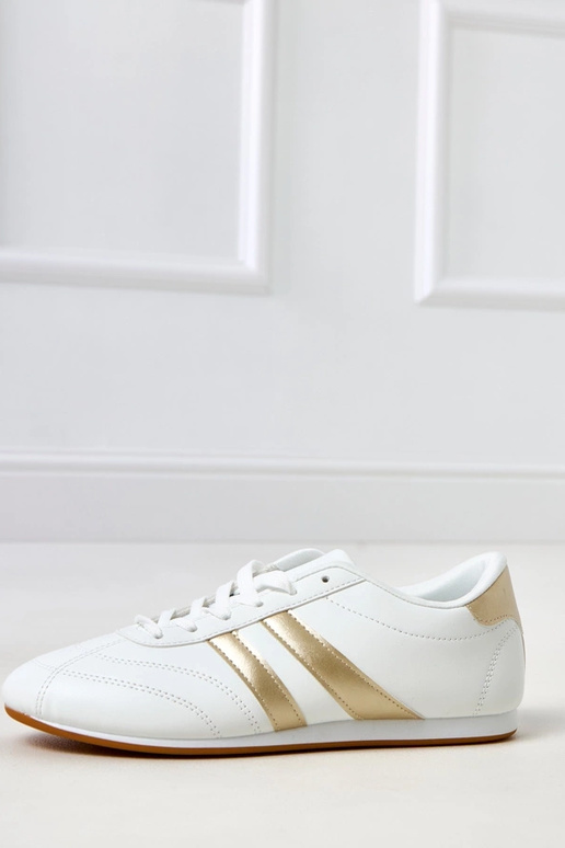 Witte tennisachtige sneakers met... Witte tennisachtige sneakers met...