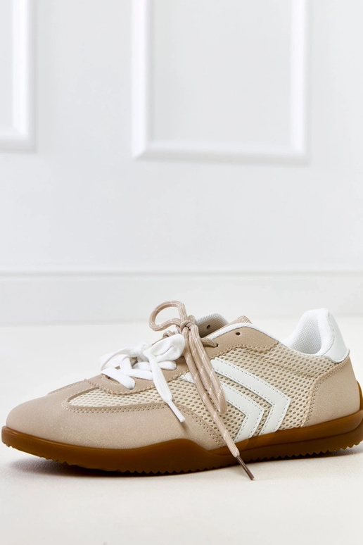 Zandkleurige sportieve schoenen van... Zandkleurige sportieve schoenen van...