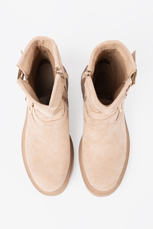 Stijlvol jsnobeige laarzen met decoratieve gespen