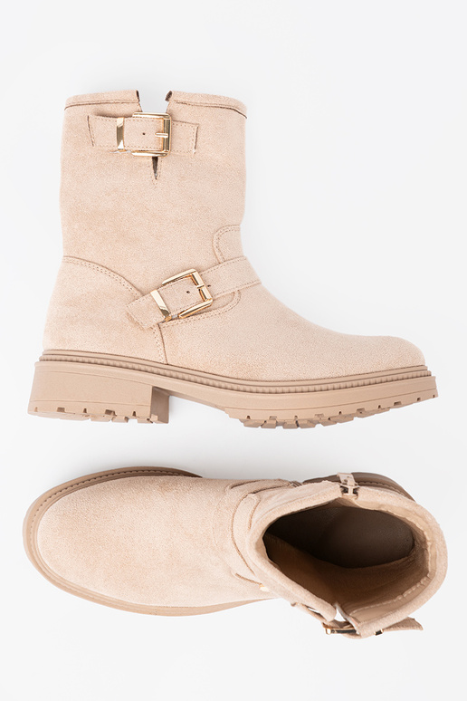 Stijlvol jsnobeige laarzen met decoratieve gespen