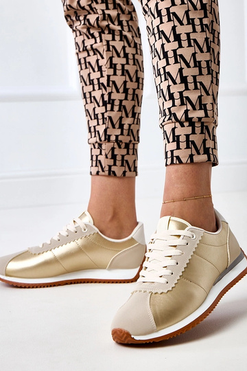 Zandkleurige sneakers met...