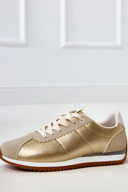 Zandkleurige sneakers met... Zandkleurige sneakers met...