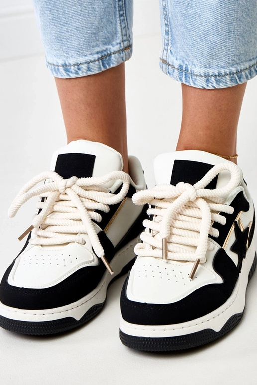 Zwart-witte platform sneakers met... Zwart-witte platform sneakers met...