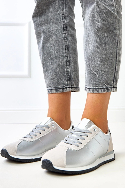 Zilveren sportschoenen met...