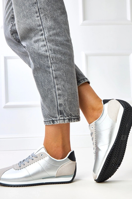 Zilveren sportschoenen met...